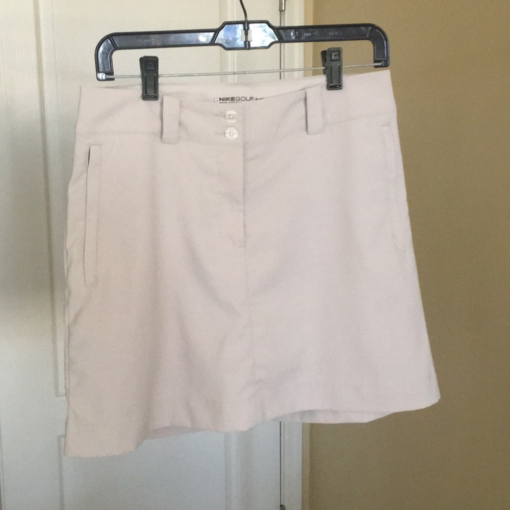 Nike golf skirt with shorts built in under skirt.